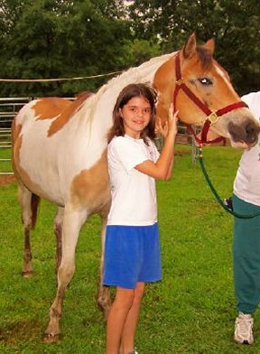 Sweet Pea with her adopter.